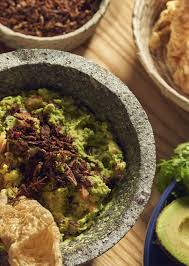 Maíz y Agave Cocina Mexicana signature dishes Queso FundidoCochinita PibilGuacamole Campestre